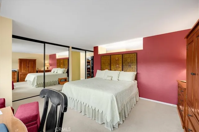 a living room with furniture and garden view