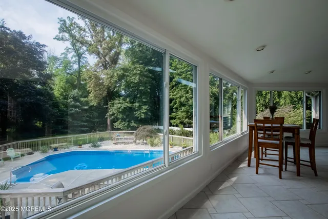 a view of a living room and dining room