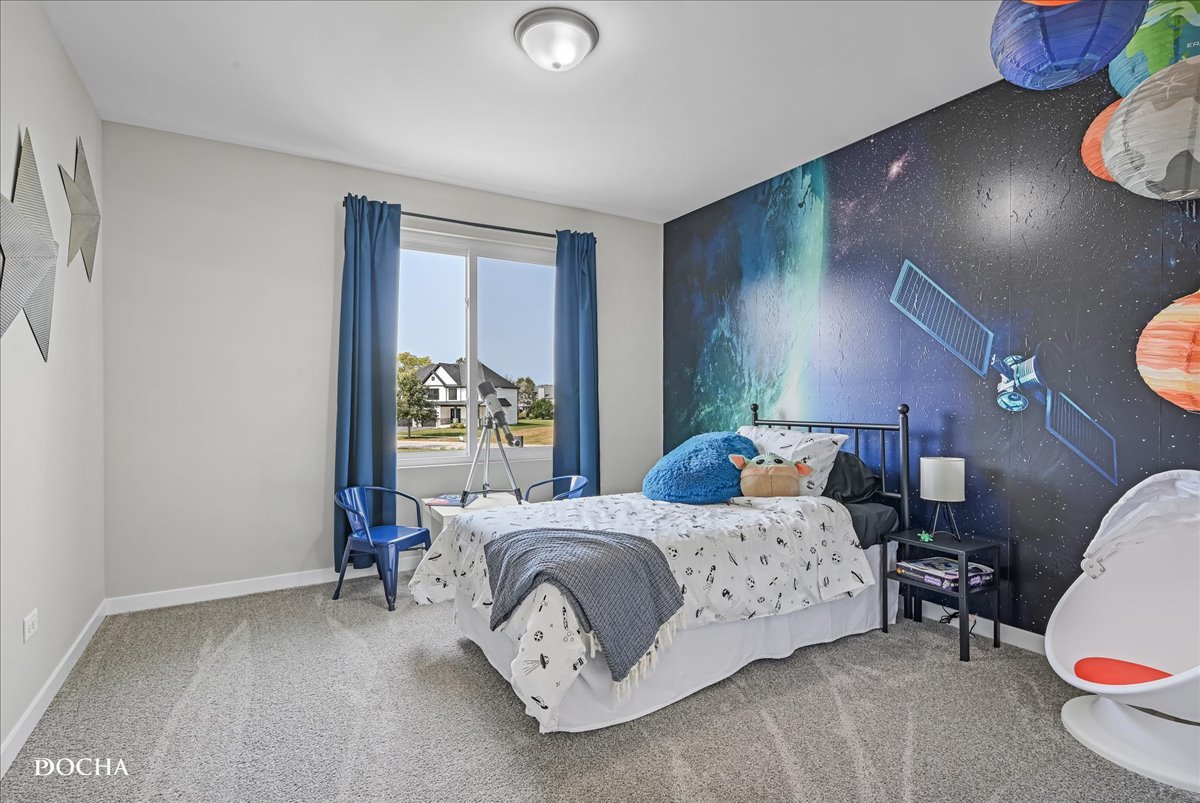 1232 Gillespie Lane Yorkville, IL 60560 - Photo 13 of 17 a bedroom with a bed and wooden floor