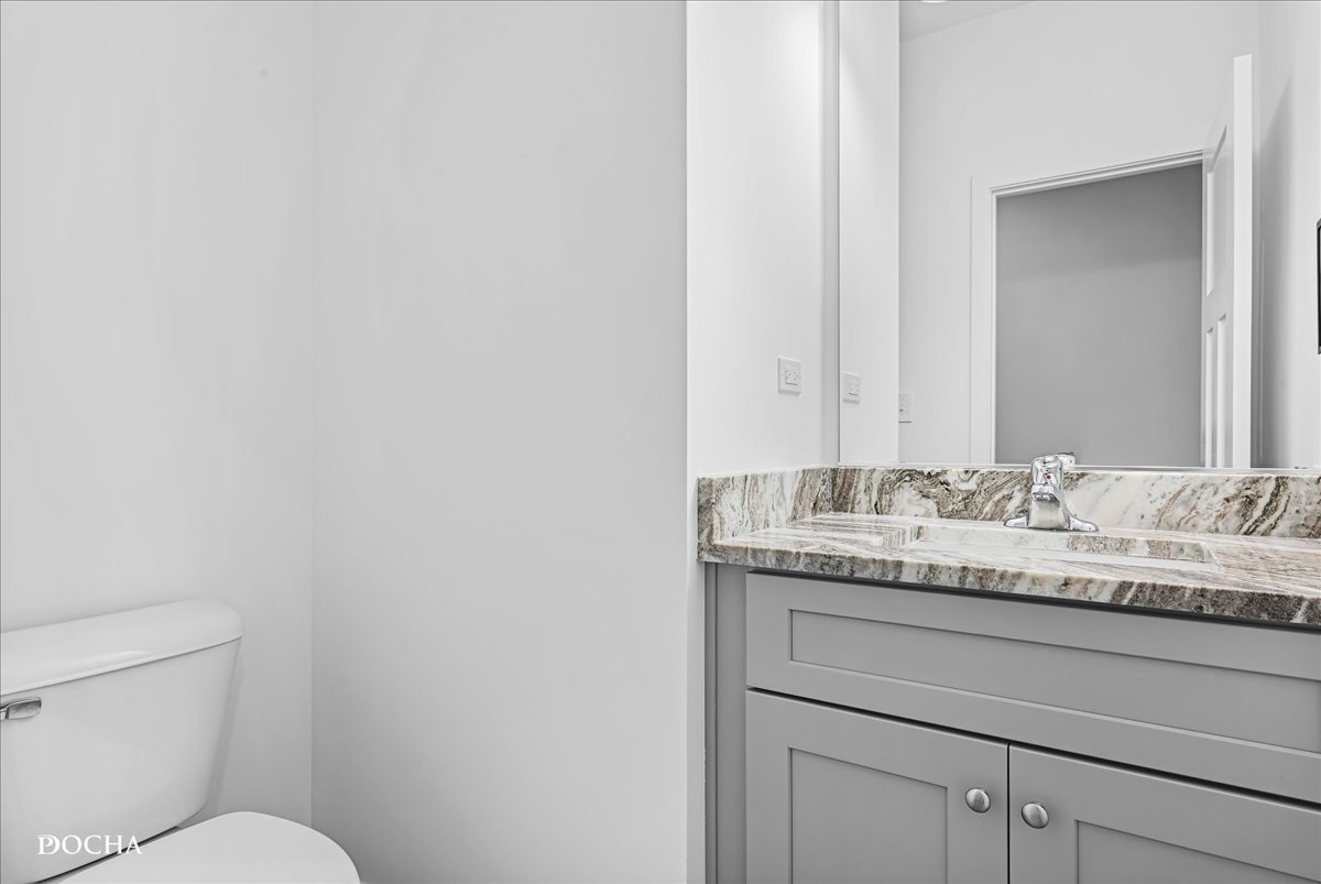 1232 Gillespie Lane Yorkville, IL 60560 - Photo 7 of 17 a bathroom with a granite countertop sink and a mirror