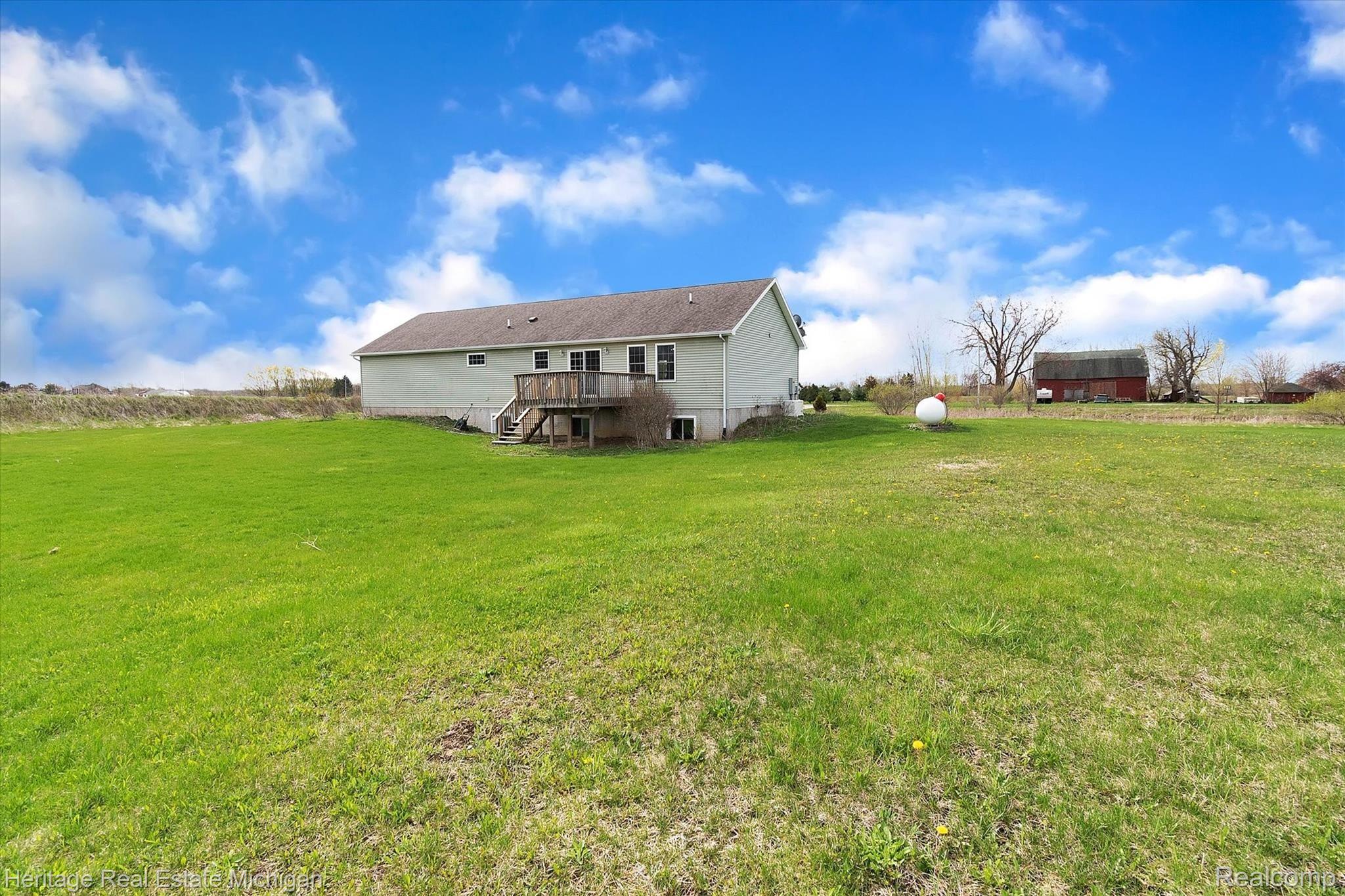 2730 Krouse Road Owosso, MI 48867 - Photo 41 of 45 Back yard view of home