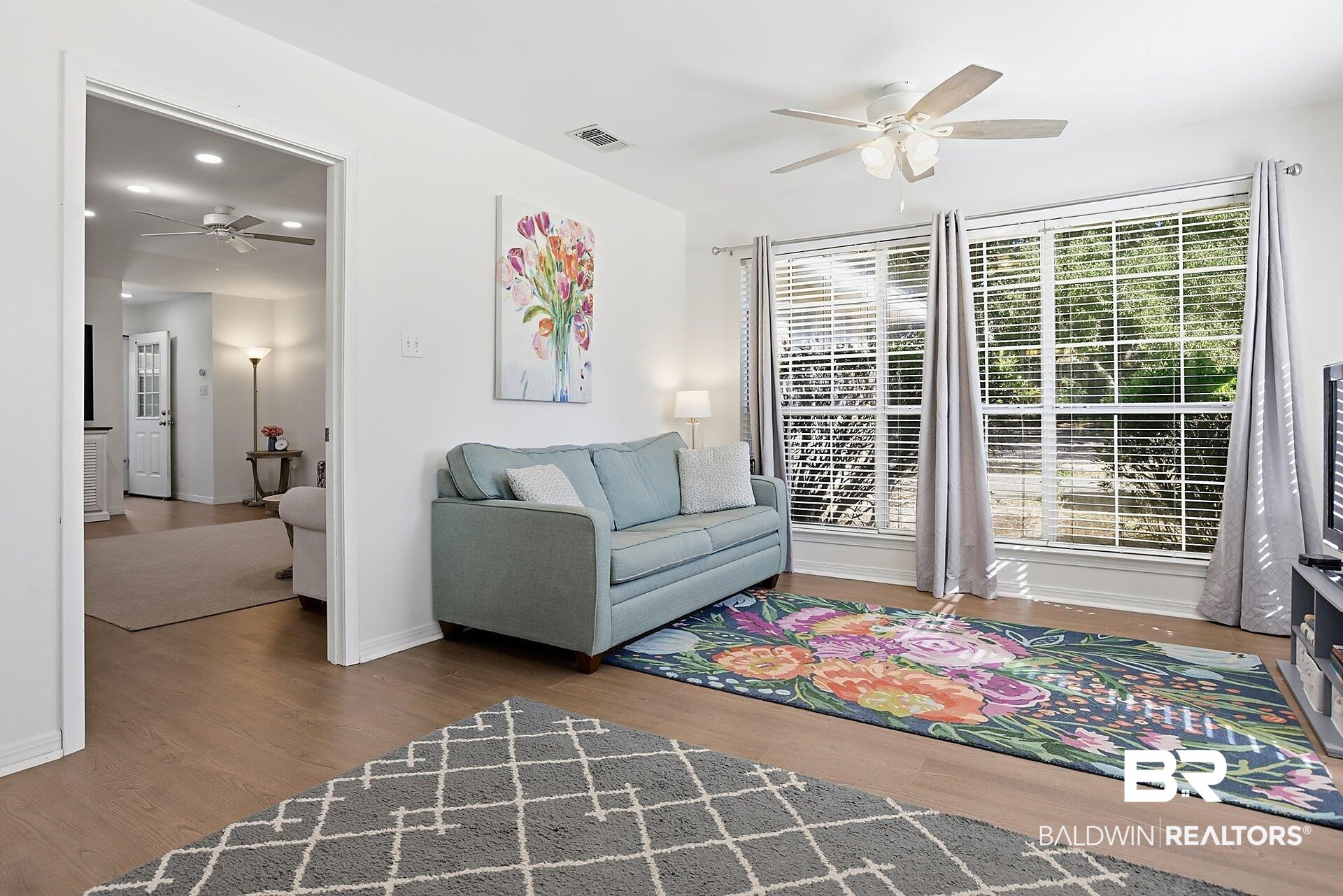 25793 Bonito Avenue Orange Beach, AL 36561 - Photo 13 of 27 Beautiful sun room as you enter the house provides extra area for entertaining