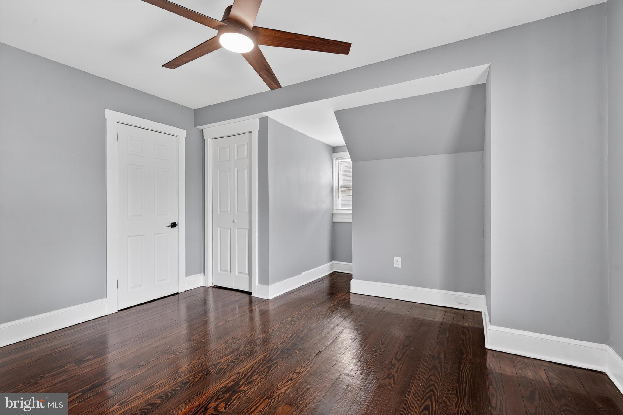 223 Noreg Place Brooklawn, NJ 08030 - Photo 24 of 36 a view of an empty room with wooden floor