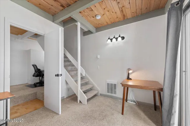 a view of entryway and workspace