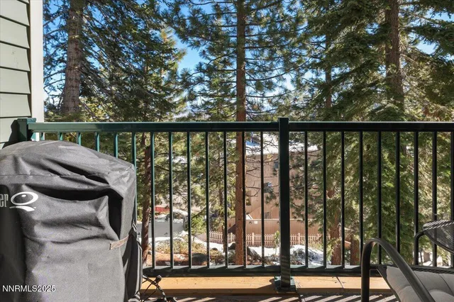 a view of balcony with furniture
