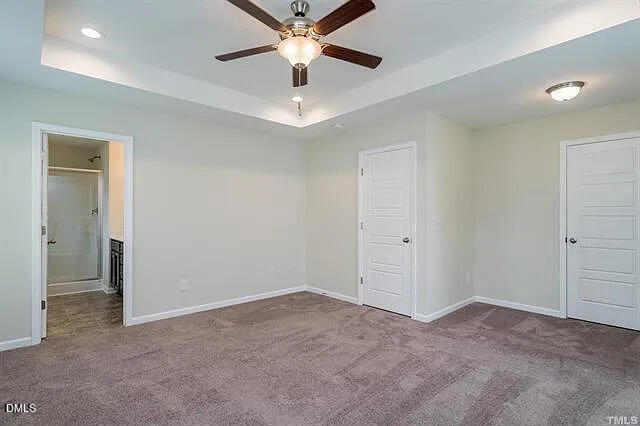 134 West Lumber Court Clayton, NC 27520 - Photo 13 of 23 a view of an empty room and a ceiling fan