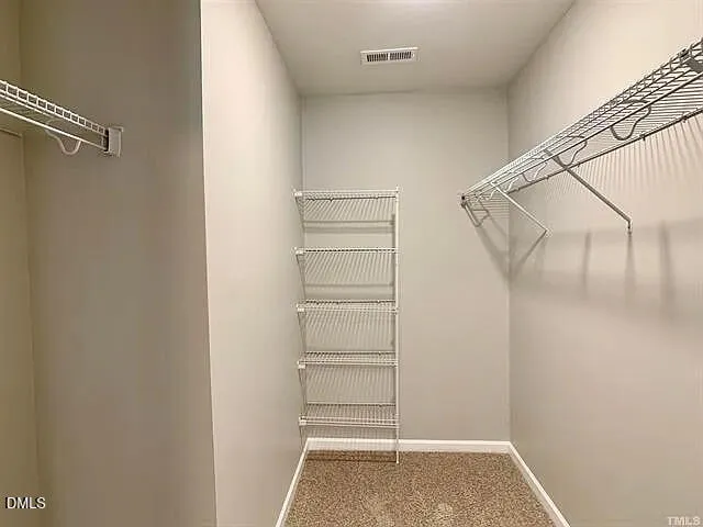 a bathroom with a toilet a sink and a shower