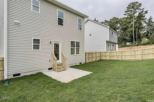 134 West Lumber Court Clayton, NC 27520 - Photo 21 of 23 a view of a white house with a yard and a tree