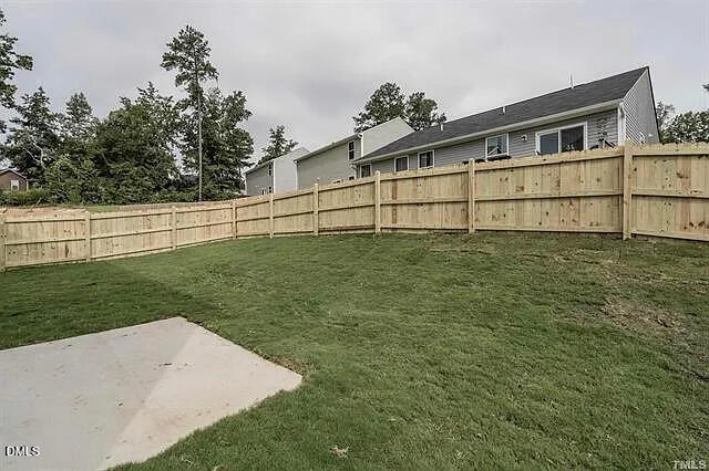 134 West Lumber Court Clayton, NC 27520 - Photo 22 of 23 a white building with a yard
