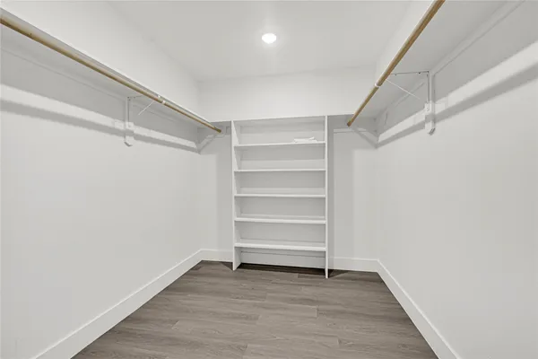 a view of an empty walk in closet