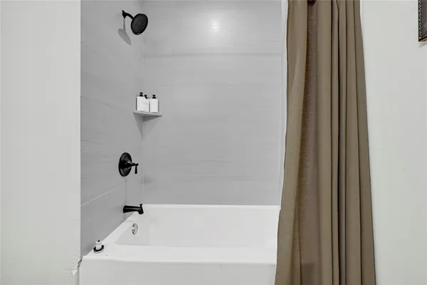a bathroom with a bathtub