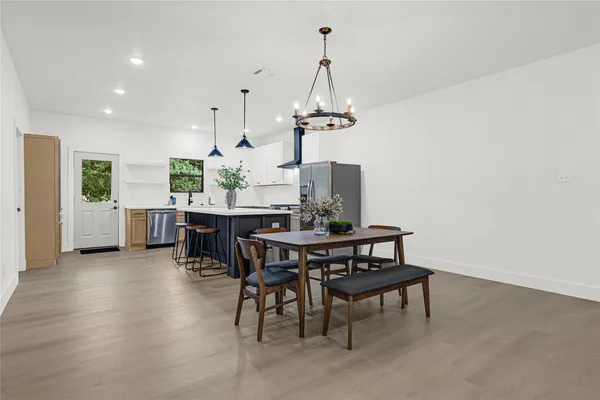 a view of a dining room with furniture
