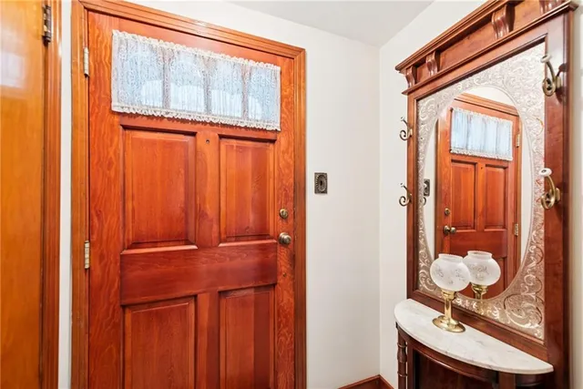 a front view of a bathroom with toilet