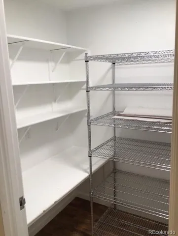 a front view of a building with garden