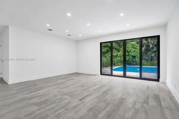 a bathroom with a double vanity sink toilet and shower