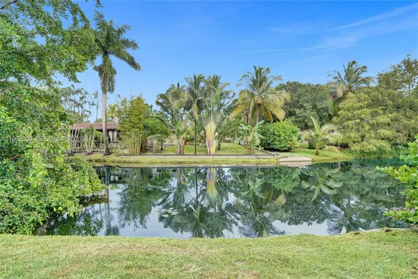 a bathroom with a toilet a sink and bathtub