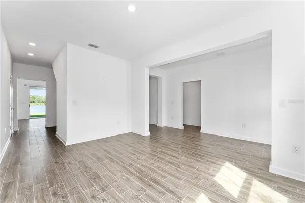 a kitchen with stainless steel appliances a sink dishwasher stove microwave and cabinets