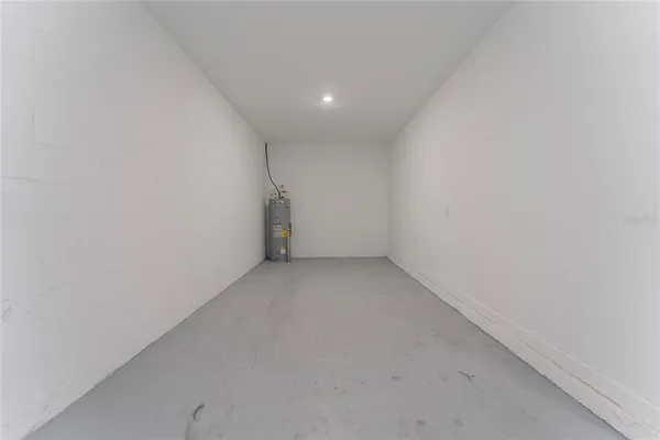 a view of a balcony with wooden floor and fence