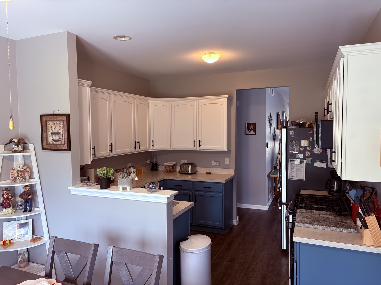 1461 Waterside Drive DeKalb, IL 60115 - Photo 12 of 29 a kitchen with stainless steel appliances granite countertop a sink stove and refrigerator