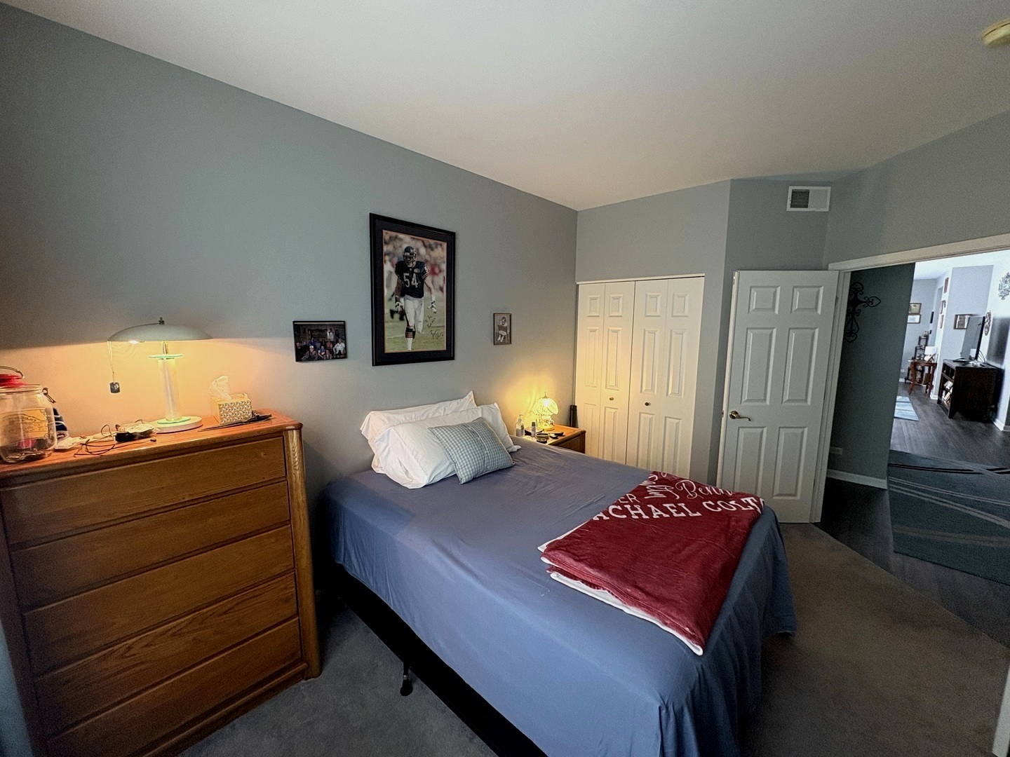 1461 Waterside Drive DeKalb, IL 60115 - Photo 22 of 29 a bedroom with a bed and dressers