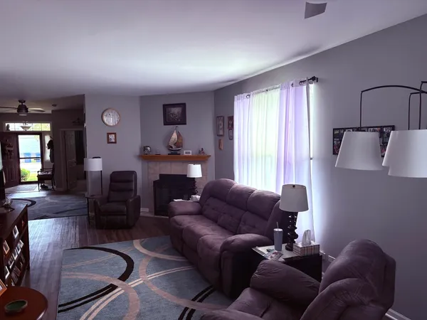 a living room with furniture or couch and a window