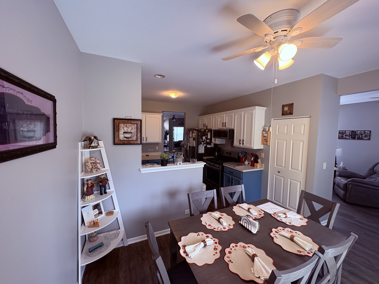 1461 Waterside Drive DeKalb, IL 60115 - Photo 10 of 29 a living room with furniture and wooden floor
