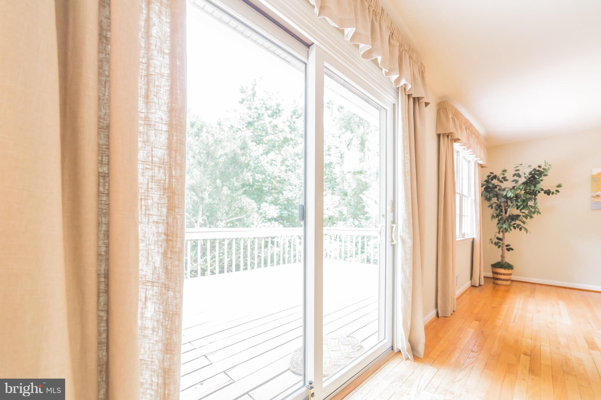 1247 Maple Road Arnold, MD 21012 - Photo 11 of 29 Sliders lead from family room out to oversize deck