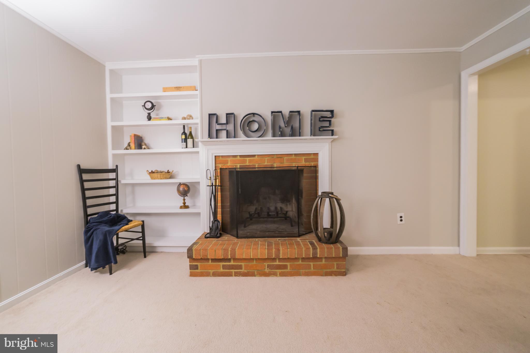 1247 Maple Road Arnold, MD 21012 - Photo 17 of 29 Cozy wood burning fireplace in lower level