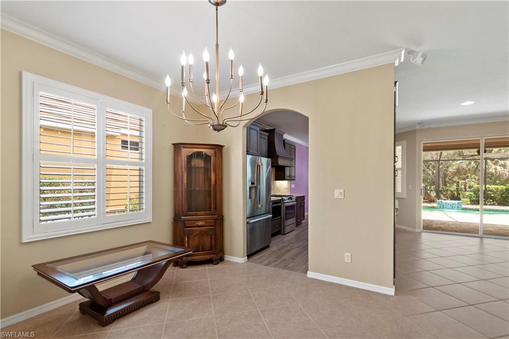 20451 Rookery Drive Estero, FL 33928 - Photo 11 of 44 a view of a room with gym equipment