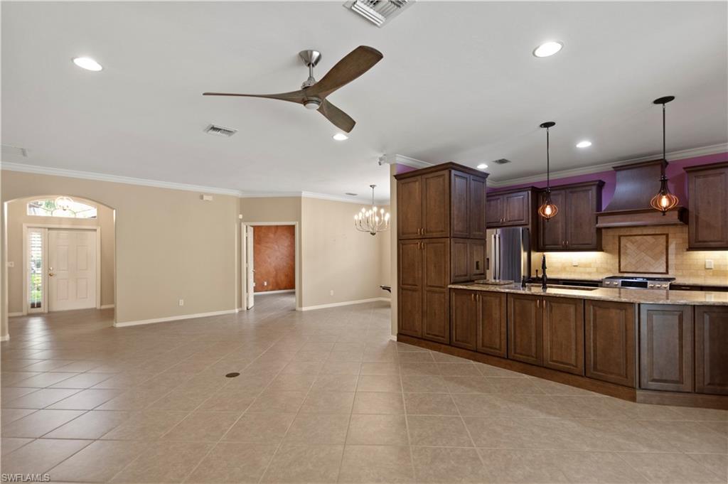 20451 Rookery Drive Estero, FL 33928 - Photo 13 of 44 a view of a kitchen with a sink and cabinets