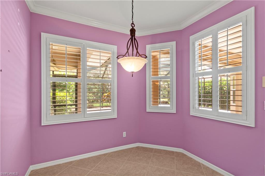 20451 Rookery Drive Estero, FL 33928 - Photo 16 of 44 a view of an empty room with windows