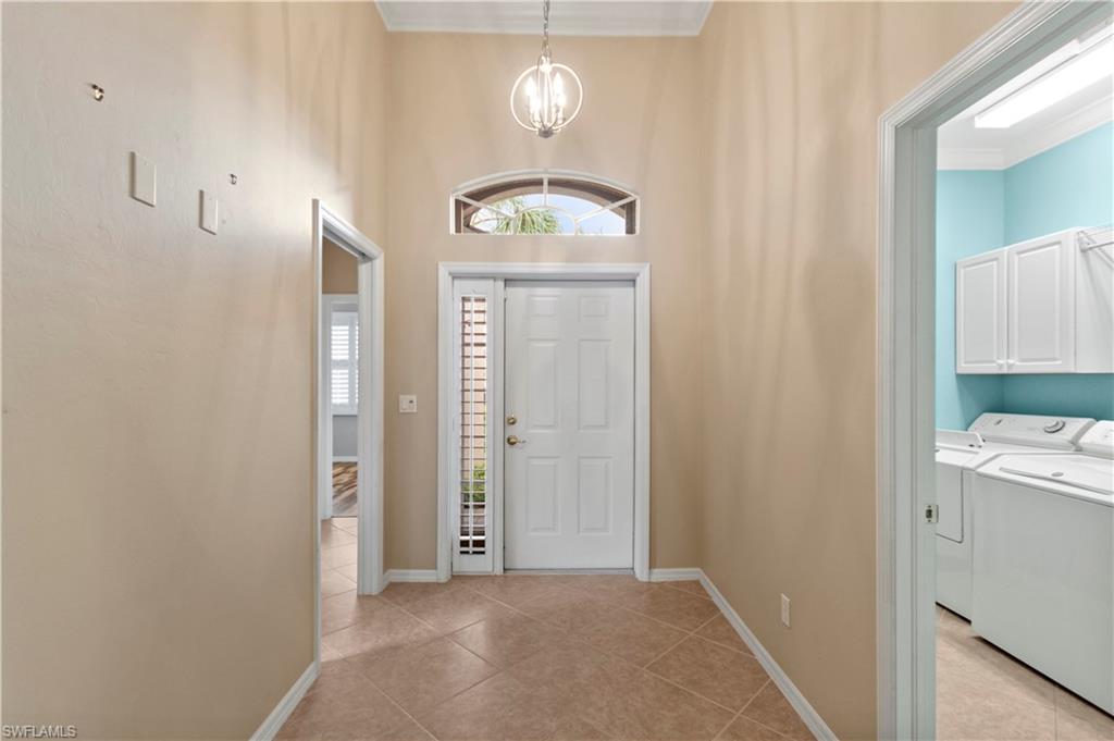 20451 Rookery Drive Estero, FL 33928 - Photo 19 of 44 a view of a hallway to rooms
