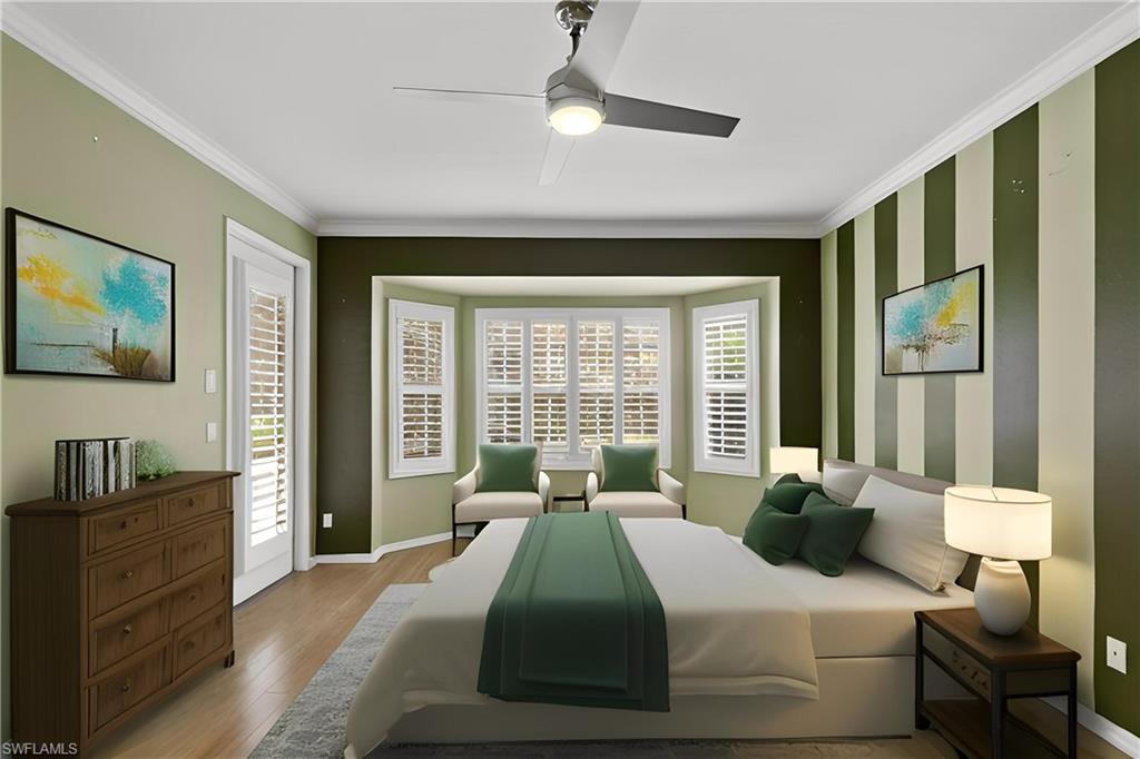 20451 Rookery Drive Estero, FL 33928 - Photo 23 of 44 a bedroom with a bed and wooden floor