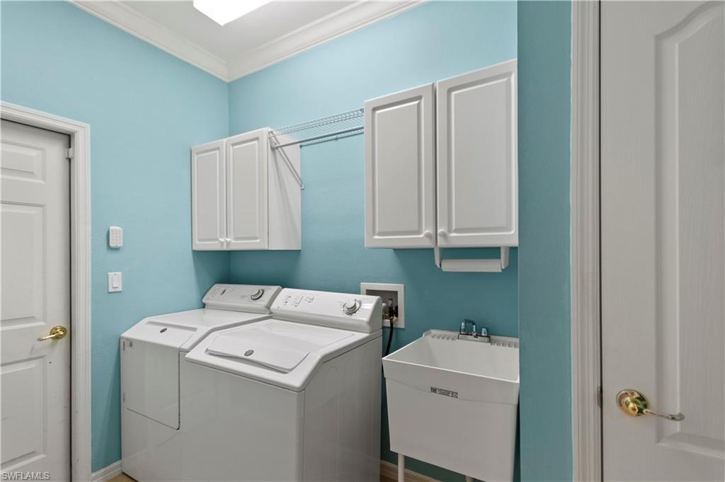 20451 Rookery Drive Estero, FL 33928 - Photo 34 of 44 a utility room with dryer and washer