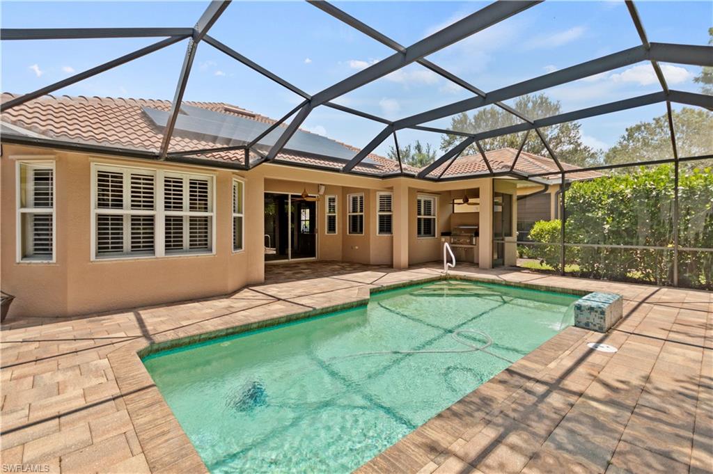 20451 Rookery Drive Estero, FL 33928 - Photo 36 of 44 a view of a house with a backyard