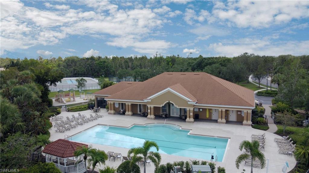 20451 Rookery Drive Estero, FL 33928 - Photo 42 of 44 an aerial view of a house swimming pool and mountain view