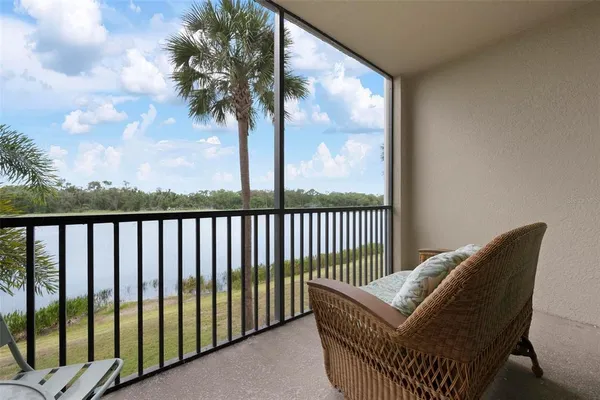 a balcony with a swing