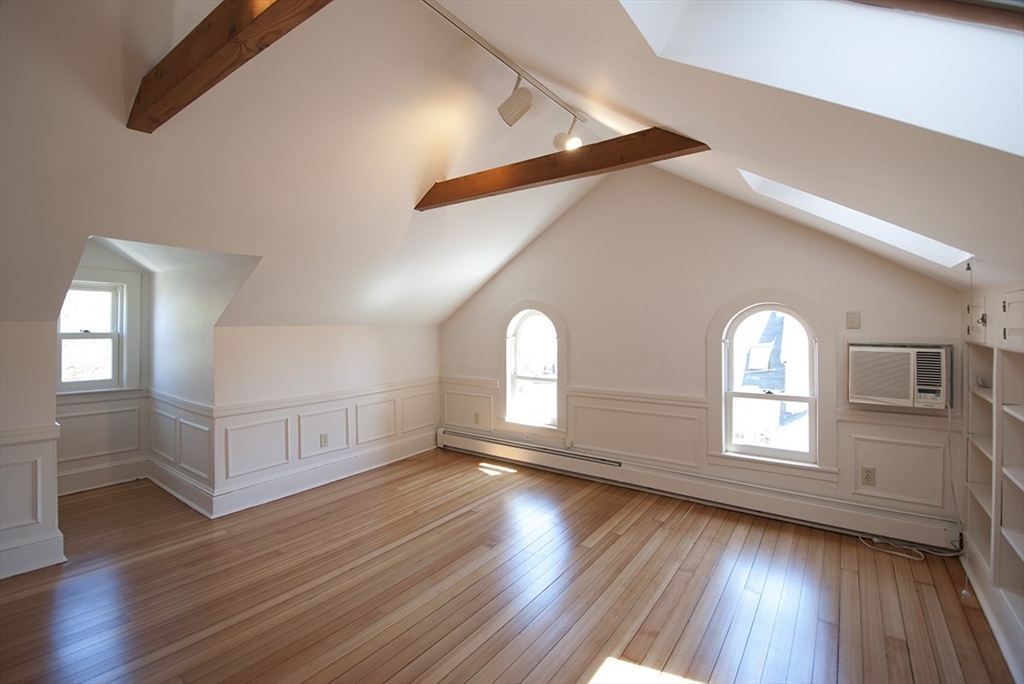 153 Watson Road Belmont, MA 02478 - Photo 15 of 20 a view of a room with wooden floors and windows