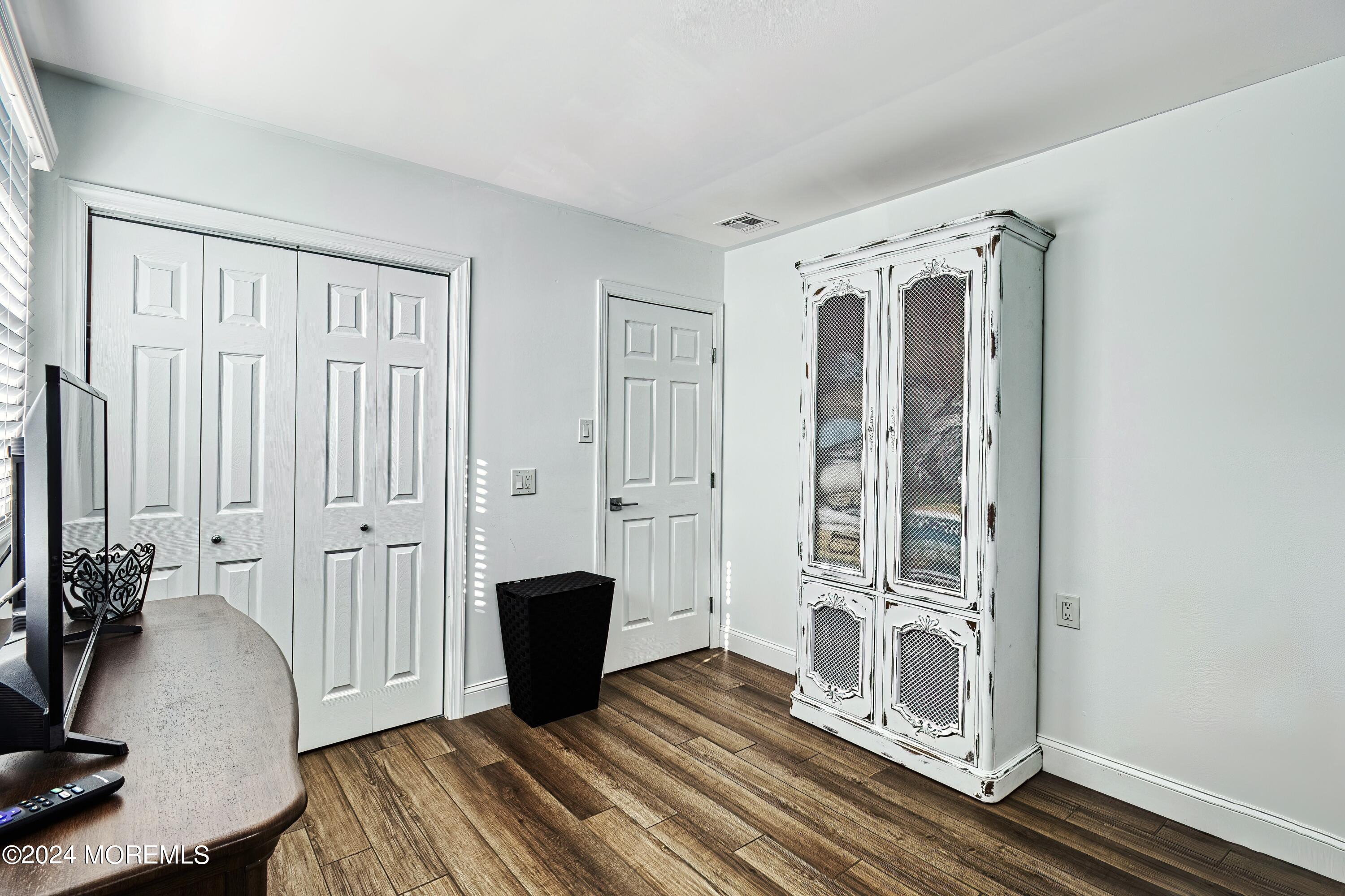 6 Masters Road Brick, NJ 08724 - Photo 26 of 38 workspace with wooden floor and windows