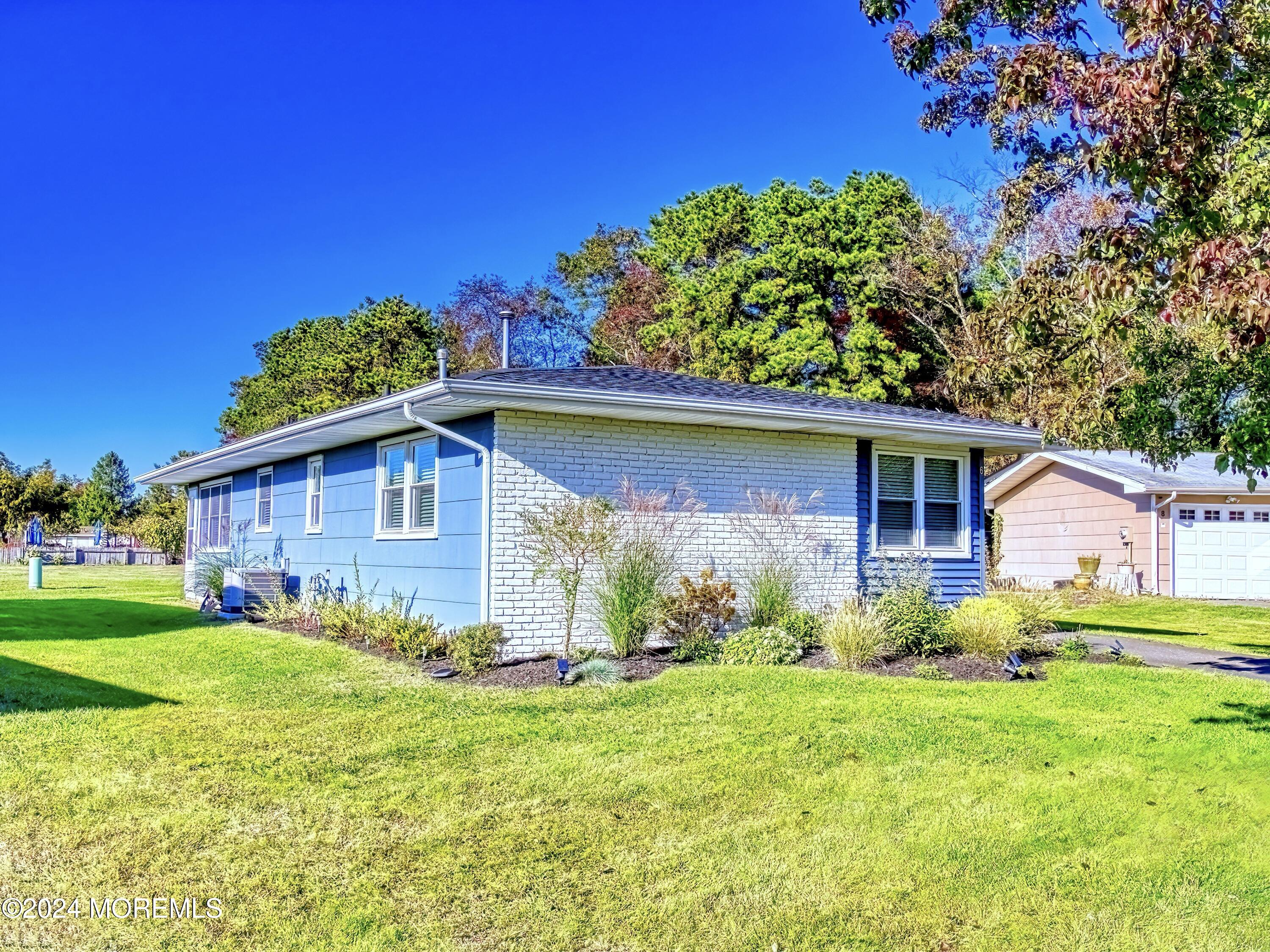 6 Masters Road Brick, NJ 08724 - Photo 27 of 38 a view of front of a house with a yard