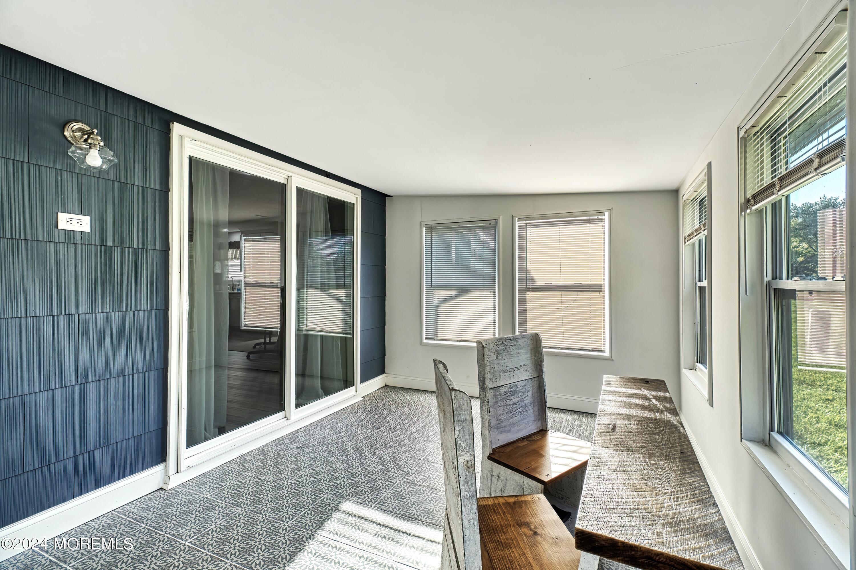 6 Masters Road Brick, NJ 08724 - Photo 31 of 38 a living room with furniture and a large window