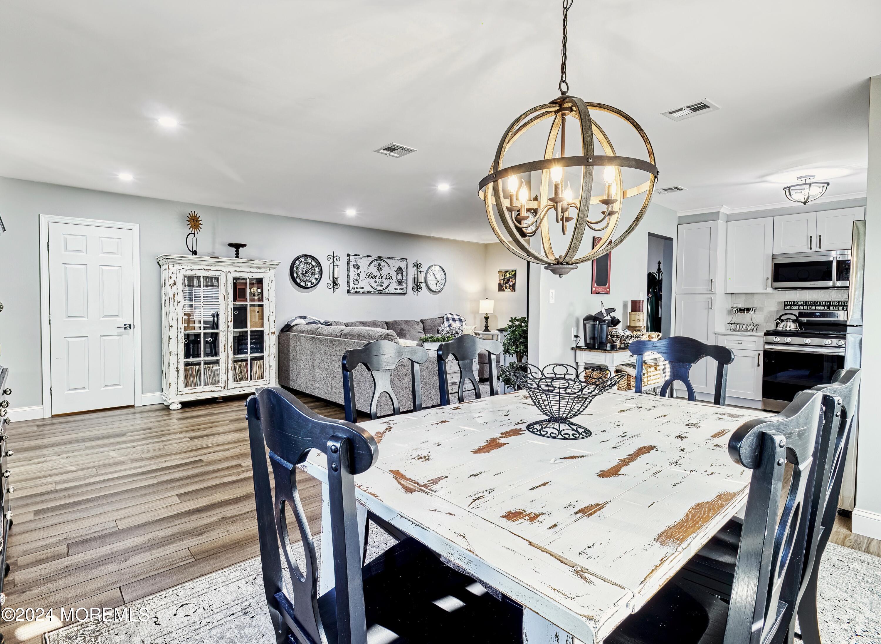 6 Masters Road Brick, NJ 08724 - Photo 10 of 38 a view of a dining room with furniture