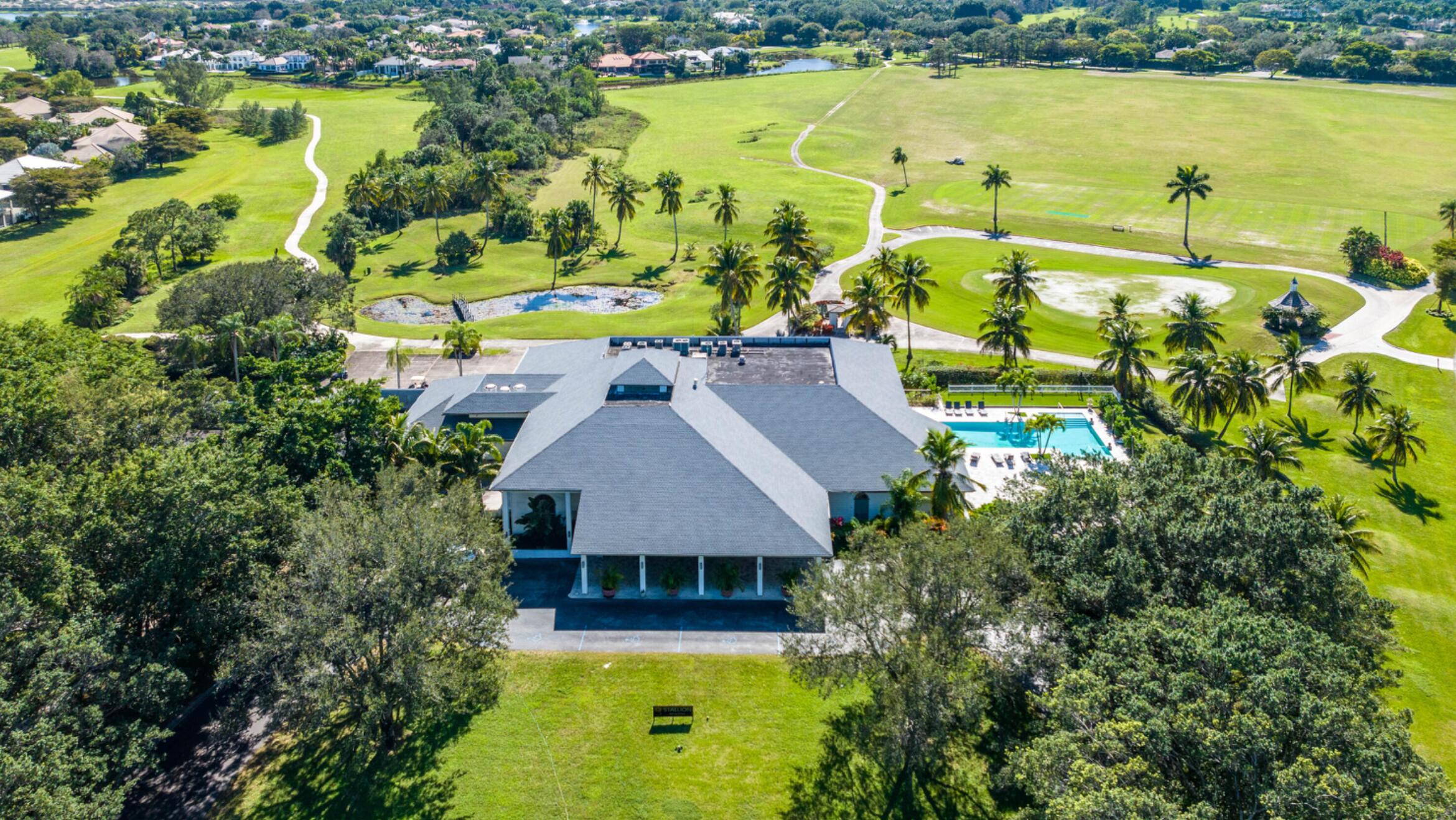 13334 Polo Club Road, Unit 216 Wellington, FL 33414 - Photo 8 of 9 an aerial view of a house with a ocean view