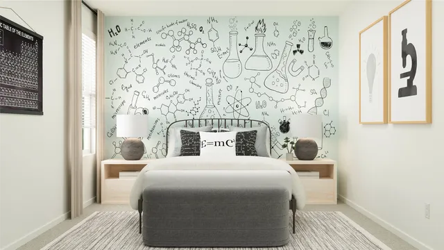 a large bedroom with a bed and a window