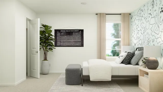 a bedroom with a bed and a view of bathroom