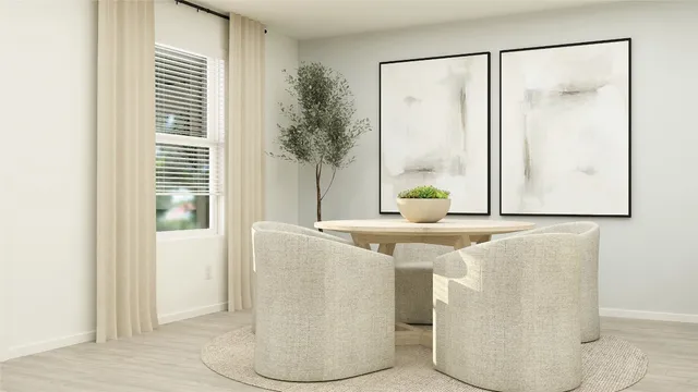 a dining room with furniture and window