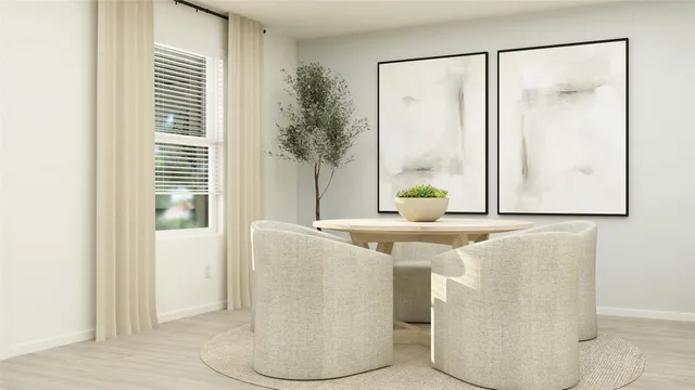 a living room with a table and a window