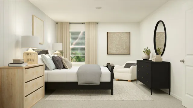 a bedroom with bed and window