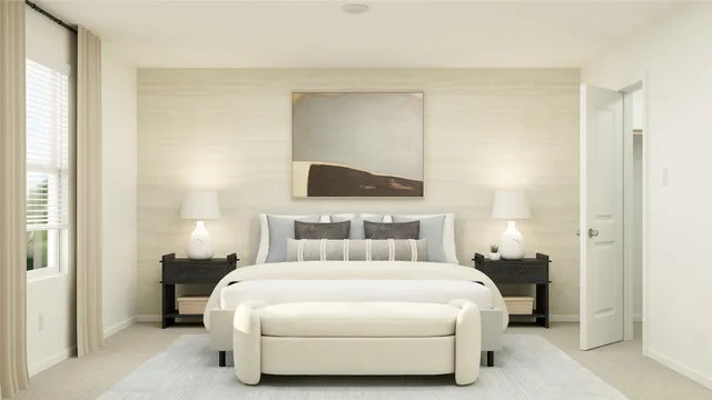 a bedroom with a bed and a night stand