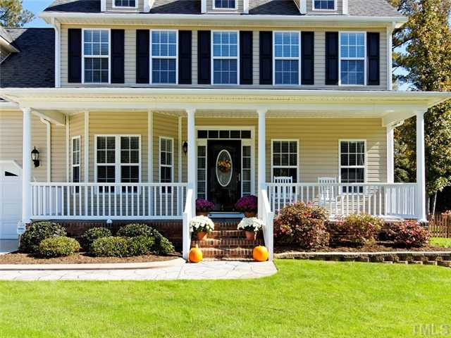 149 Alfred Court Raleigh, NC 27603 - Photo 2 of 24 Stamped Concrete Walkway And Rocking Chair Front Porch. Yard is Beautifully Landscaped Front & Back w/ Irrigation System Throughout! Porch